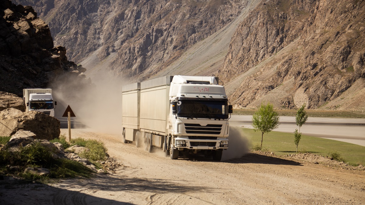 Commercial trucks on the Pamir Highway in Tajikistan.